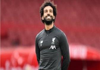 بالصور .. محمد صلاح ينقذ رجل بلا مأوى في ليفربول